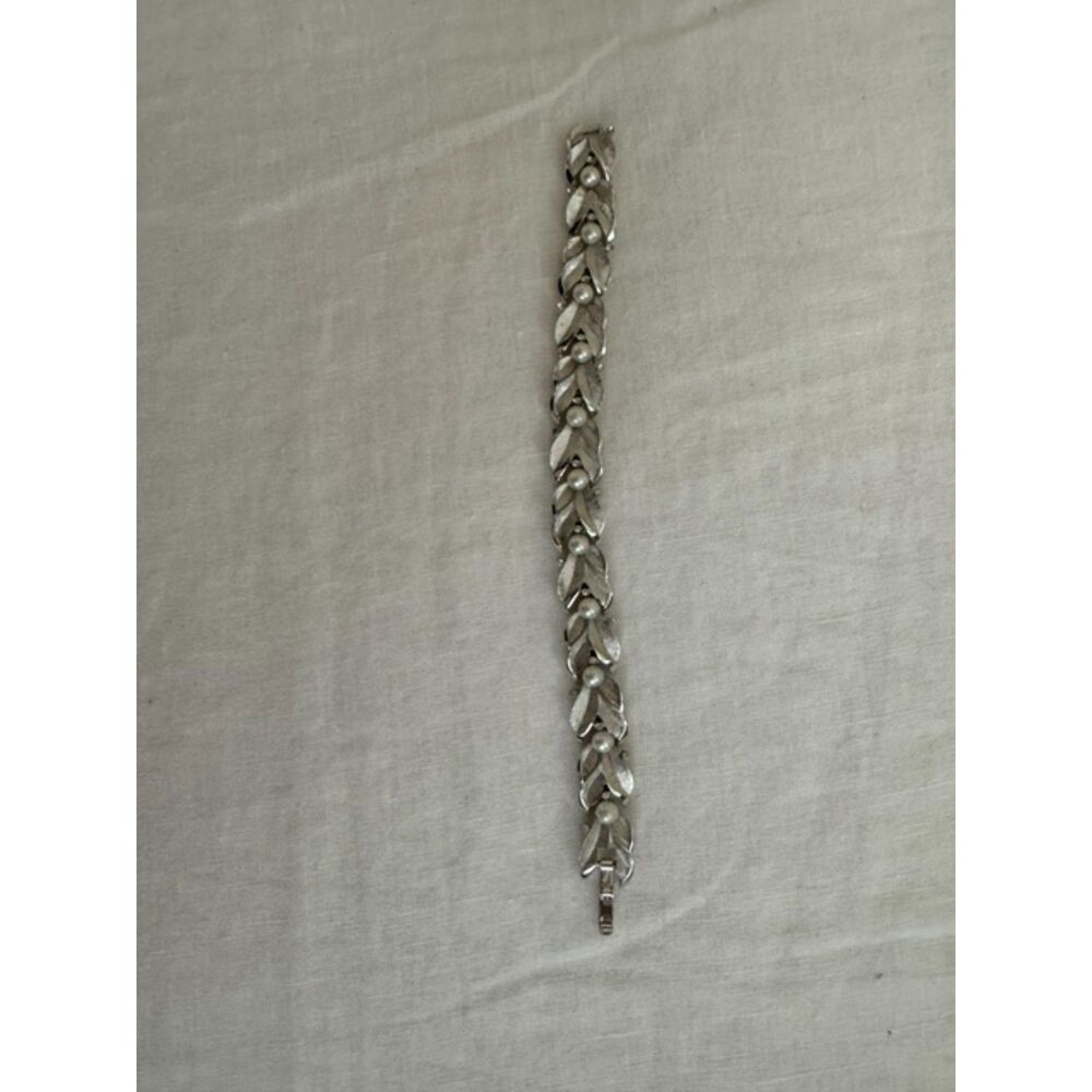 Vintage Trifari pearl and AB bracelet, Silver-tone 7 inches long.